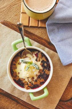Crumble served in pot with ice cream and coffee clipart