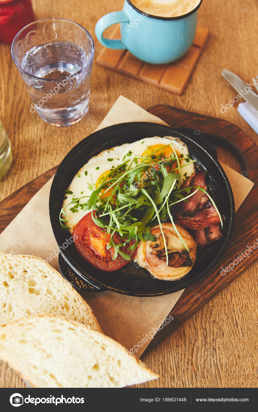 Fried Eggs Tomatoes Mushrooms Pan Table Stock Photo by ©AntonMatyukha