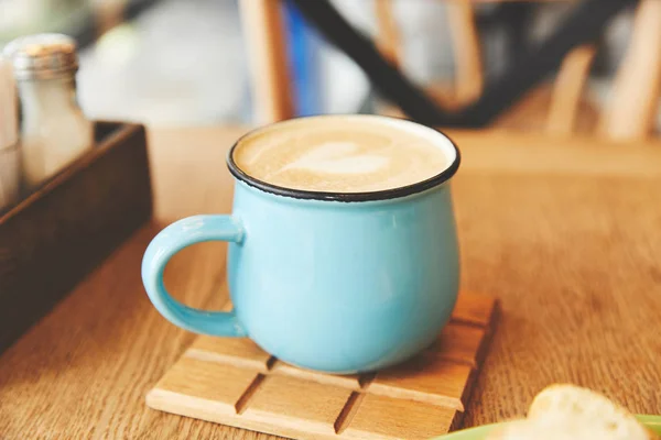 Hot Cappuccino Blue Mug Table — Stock Photo, Image