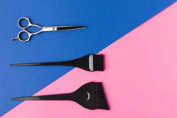 Top View Hairdressing Tools Pink Blue Diagonal Background — Stock Photo, Image