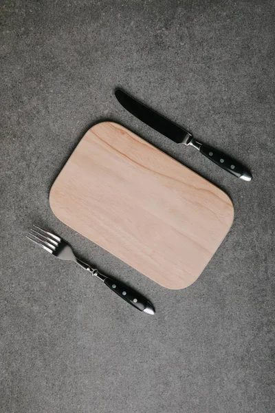 Top View Wooden Board Fork Knife Grey — Free Stock Photo