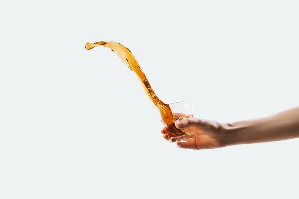 Cropped View Hand Holding Glass Splashing Coffee Isolated White — Stock Photo, Image