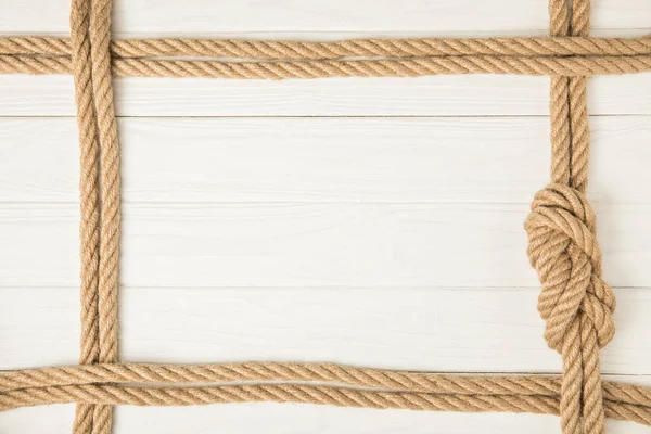 Top View Frame Made Brown Nautical Ropes Knot White Wooden — Stock Photo, Image