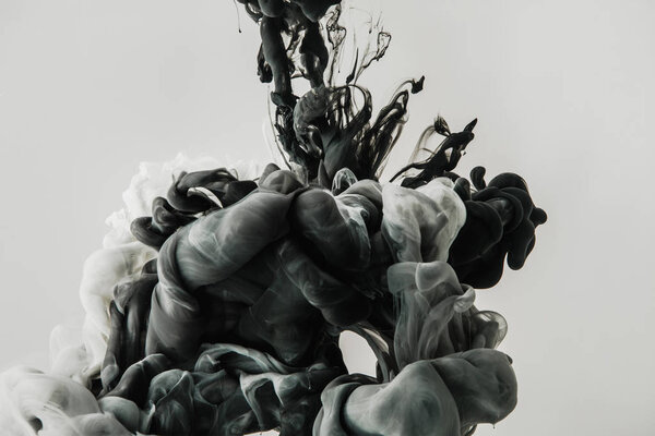 close up view of mixing gray smoke isolated on gray