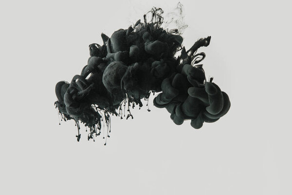 Close up view of black ink in water isolated on gray