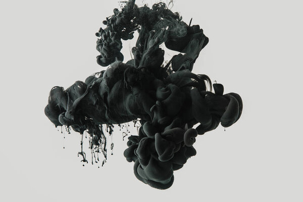 Close up view of black ink in water isolated on gray