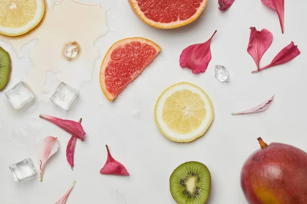 Top View Arrangement Fresh Exotic Fruits Ice Cubes Flower Petals — Stock Photo, Image