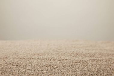 close up view of sand texture on grey backdrop clipart