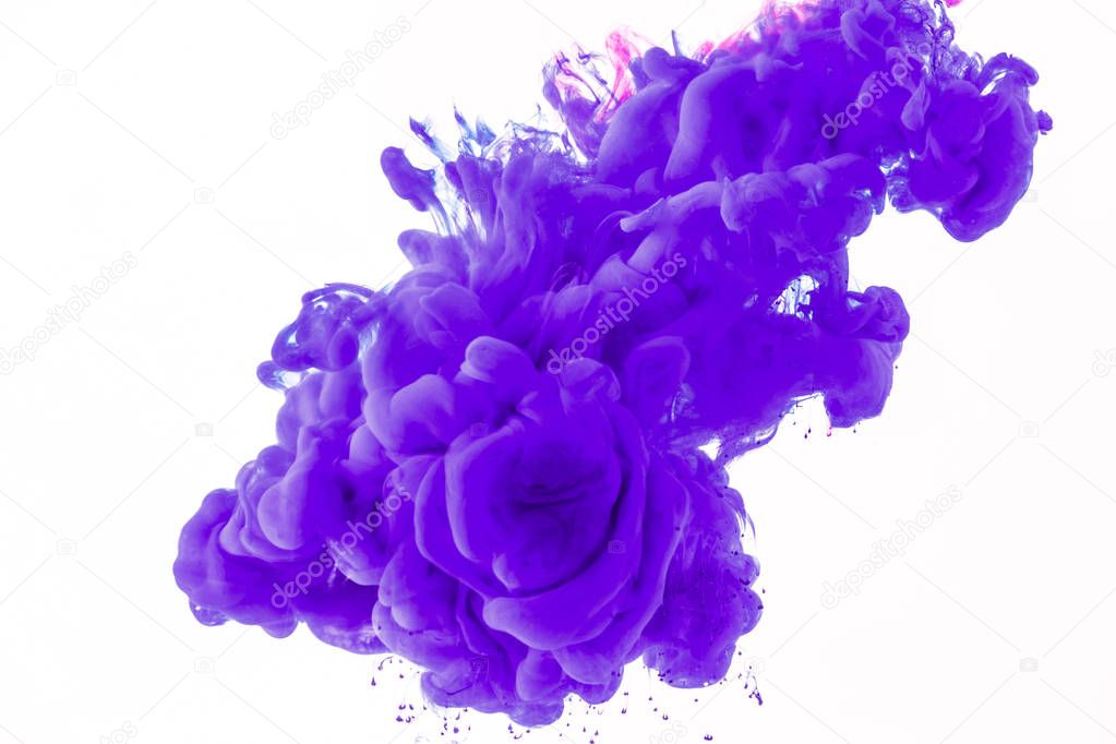 creative design with flowing purple paint in water, isolated on white