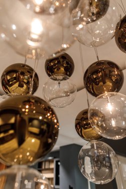 Decorative modern shiny spherical chandelier  clipart