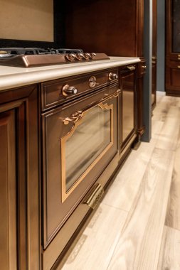 Interior of kitchen with vintage style baking oven clipart