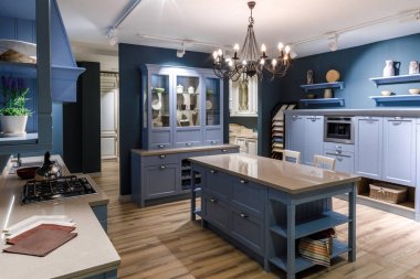 Renovated kitchen interior in blue tones clipart