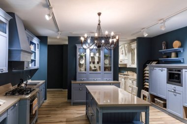 Interior of modern kitchen in blue tones clipart