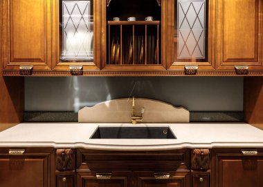 Renovated kitchen interior with vintage style sink clipart