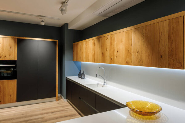 Stylish kitchen with modern white counter