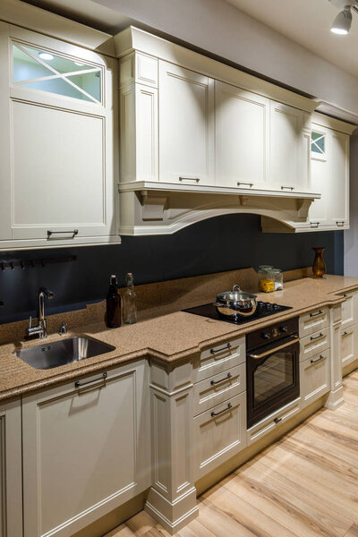 Renovated kitchen interior with stove counter