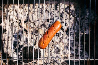 Top view of sausage grilled for outdoors barbecue clipart
