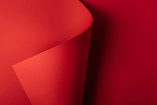 明るい赤色の装飾的な紙の抽象的な背景 — ストック写真