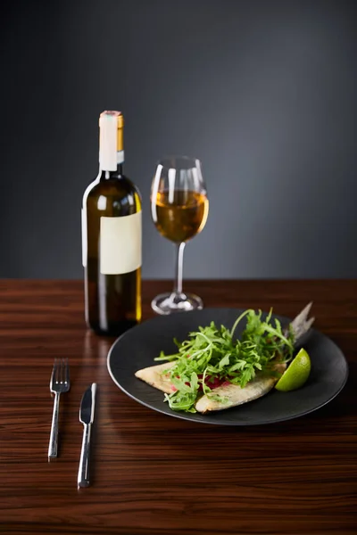 Tasty Restaurant Fish Steak Lime Arugula Wooden Table Cutlery White — Stock Photo, Image