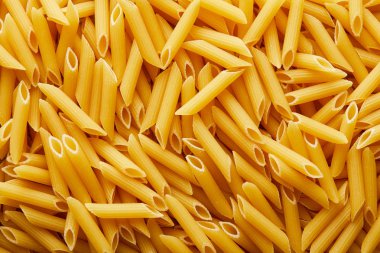top view of raw penne seamless background pattern clipart