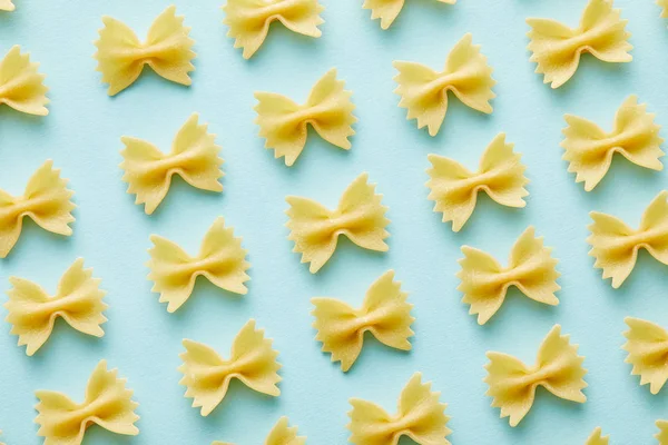 Flat Lay Raw Farfalle Blue Background — Stock Photo, Image