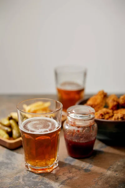 Selective Focus Chicken Nuggets French Fries Gherkins Glasses Beer Stone — Stock Photo, Image