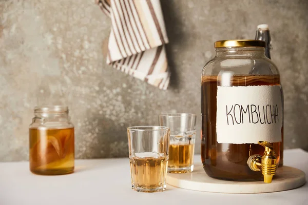 Jar Kombucha Glasses Textured Grey Background Striped Napkin — Stock Photo, Image