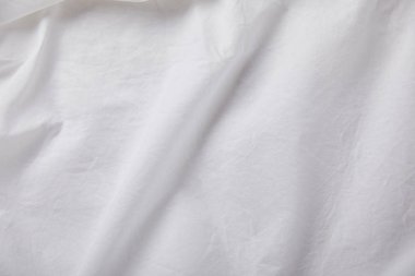 Kopya alanı olan buruşmuş beyaz kumaşın üst görünümü