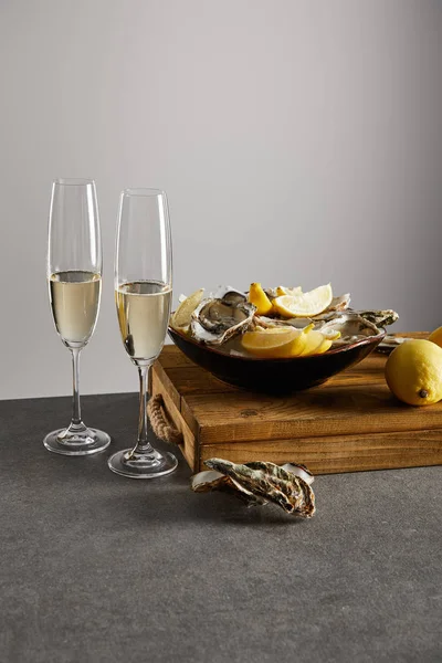 Oysters Fresh Lemons Bowl Champagne Glasses Sparkling Wine Isolated Grey — Stock Photo, Image