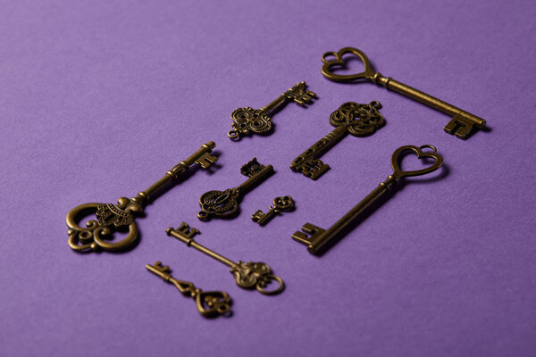 vintage keys on violet background