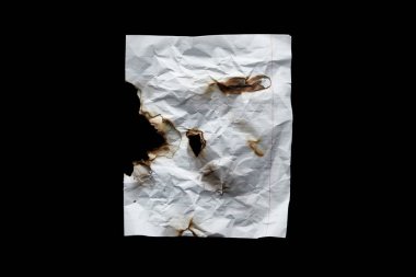 top view of empty white crumpled and burnt vintage paper isolated on black clipart