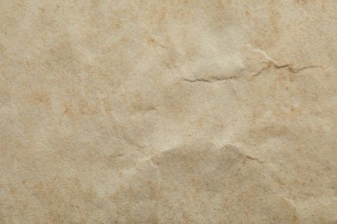 Kopya alanı ile buruşmuş bej kağıt dokunun üst görünümü