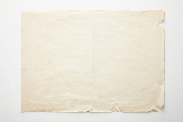 top view of empty vintage paper on white background