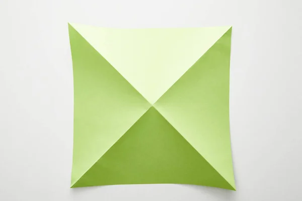 Bovenaanzicht Van Leeg Groen Origami Papier Witte Achtergrond — Stockfoto