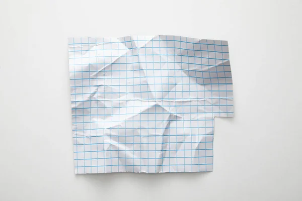 Top View Empty Crumpled Grid Paper White Background — Stock Photo, Image