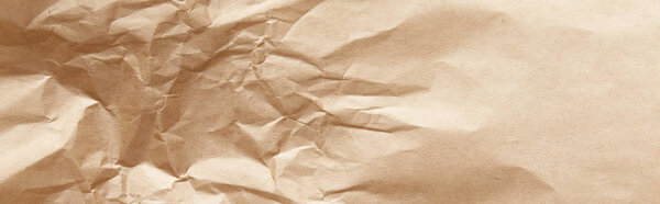 top view of empty crumpled craft paper texture, panoramic shot
