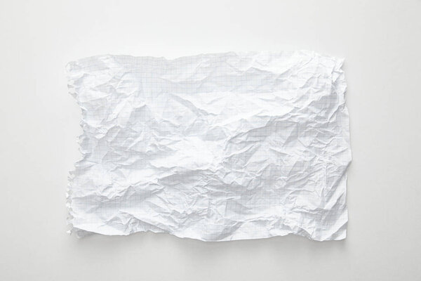top view of empty crumpled paper on white background