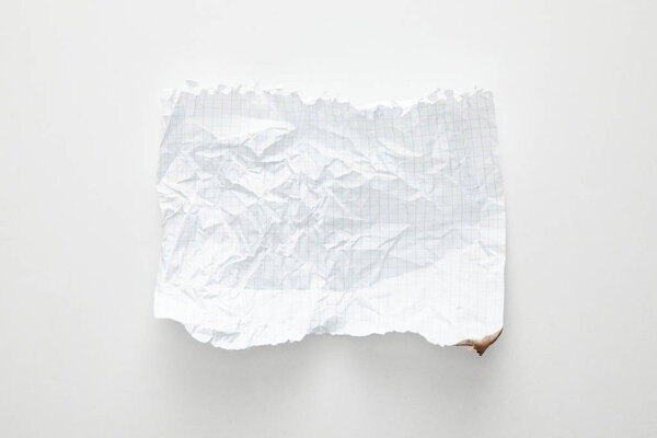 top view of empty crumpled paper on white background