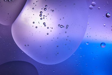 Beautiful abstract blue and purple color background from mixed water and oil  clipart