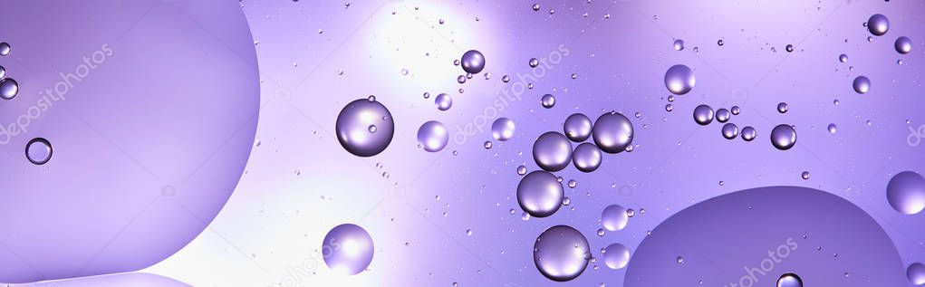 panoramic shot of abstract purple color texture from mixed water and oil bubbles