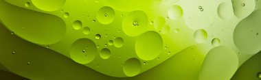 Karışık su ve yağdan elde edilen güzel yeşil renkli soyut arkaplan görüntüsü