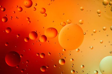 Karışık su ve yağdan soyut turuncu ve kırmızı arkaplan 