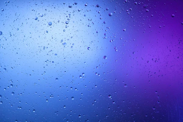 蓝色和紫色混合水和油的美丽的抽象背景 — 图库照片