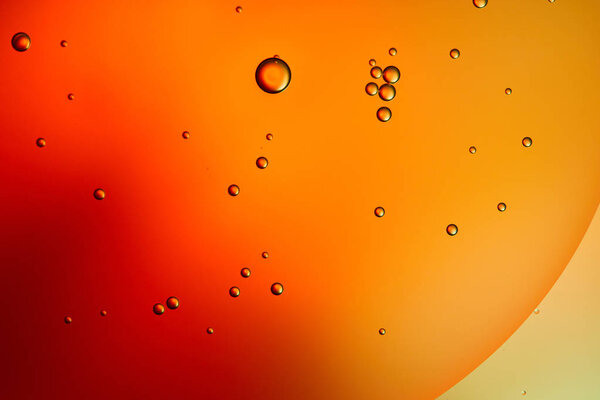 abstract orange and red color background from mixed water and oil 