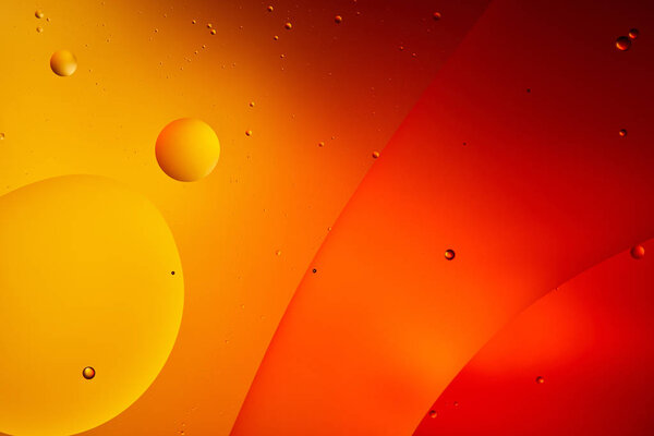 abstract orange and red color background from mixed water and oil 