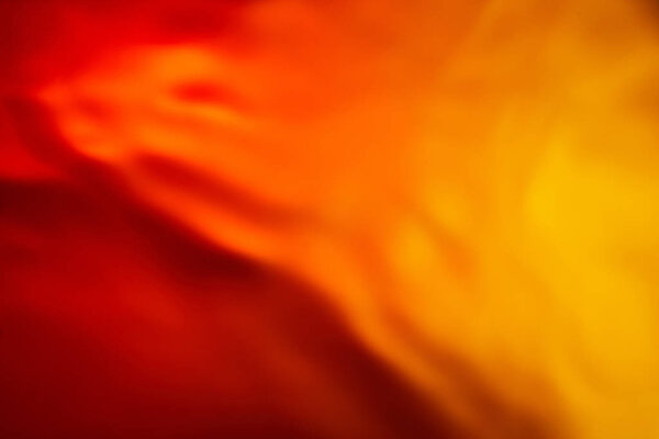 Beautiful abstract background from mixed water and oil in orange color