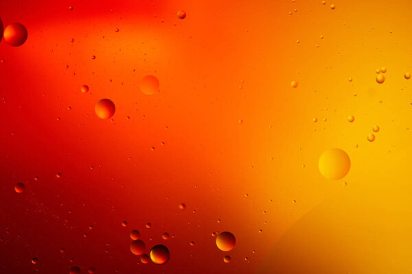 abstract orange and red color background from mixed water and oil 