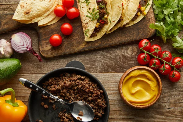 Top View Delicious Tacos Minced Meat Cutting Board Ingredients Wooden — Stock Photo, Image