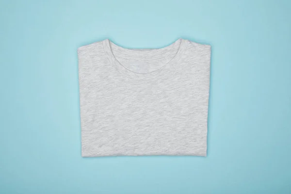 Top View Blank Basic Grey Shirt Isolated Blue — Stock Photo, Image
