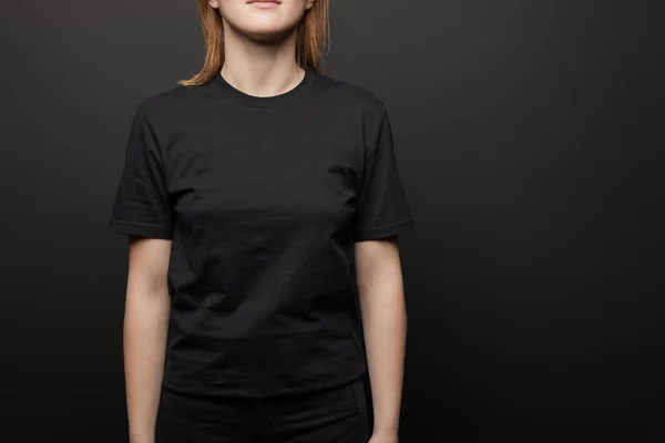 Cropped View Woman Blank Basic Black Shirt Black Background — Stock Photo, Image